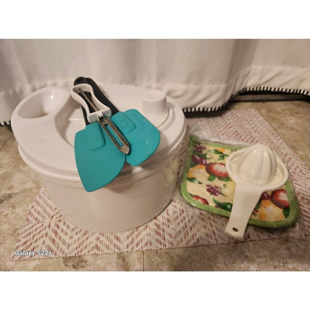 Kitchen accessories, salad spinner, spatulas, pot holders, peeler &  juicer